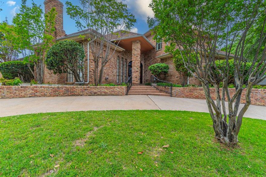 This Beautiful Home is a Must See and has a ton to offer a new family.  The home is situated on a beautiful 
corner lot that is slightly elevated, giving it a majestic feel as you pass by.  The seller is willing to remove 
rocks and add sod before close if preferred.  With 4 bedrooms, 4 bathroom and 3,788 well-appointed 
square feet of luxury living space, this home is certainly an entertainer’s dream.  As you enter through the 
front doors, the large open foyer, living and dining area invite you in with beautiful natural wood trim and 
stair case as well as real stone tile and wood floorings giving a feeling of warmth and custom finish.  
Further into the home, you’ll find a custom bar built into the corner of the staircase that features a sink, 
wine rack, storage and a wine or beverage cooler that can be set to that perfect temperature for your white 
wines or cooler for other drinks.  The kitchen features granite countertops, a large island with a hoodless 
cook top and plenty of prep space.  There are more cabinets than any large family could ever fill as well as 
a very decent sized pantry.  Multiple built-ins also offer increased storage space.  The primary bedroom 
offers the comfort of its own fireplace and a large bathroom with lots of natural lighting.  Each bedroom in 
the home has their own bathrooms for ultimate comfort and privacy.  The home also features an office or 
game room with lots of windows for natural light and a nice view of the pool and back yard oasis.  Step 
through the arched double doors onto the cover patio and pool area with space for comfortable lounge 
furniture and entertaining. Buyer to verify schools and measurements.