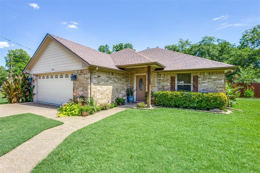 Sellers Offering $5K in Concessions!!!! Beautifully maintained, well built custom brick home in a quiet neighborhood with NO HOA! Situated on immaculate landscaped grounds with dedicated guest parking, this home offers comfort, style, and thoughtful upgrades throughout. The open-concept living and dining areas feature a cozy fireplace and recessed lighting—perfect for everyday living or entertaining. The chef’s kitchen includes a dual-oven stainless range, sleek black single-bowl sink, abundant cabinetry and drawers, and gas line access for future upgrades. Enjoy a split-bedroom layout with solid flooring throughout—no carpet! The spacious primary suite features double doors leading to a luxurious bath with granite counters, dual sinks, makeup vanity, garden tub, and separate shower. ENERGY-EFFICIENT features include Radiant barrier insulation, Low-E windows that tilt inward for easy cleaning, and a Tankless water heater (less than 2 years old). Fresh interior paint and new roof installed Summer 2024! Step outside to a huge private backyard with covered patio, privacy fence, and storage shed—perfect for gatherings. Oversized garage offers extra storage or workshop space. Close to schools, park, downtown Tioga, and DNT. Tioga ISD 4-day school week! Being located close to the fire station may also offer potential home insurance savings. Don’t miss the opportunity to own this move-in ready home in a welcoming neighborhood with great neighbors!