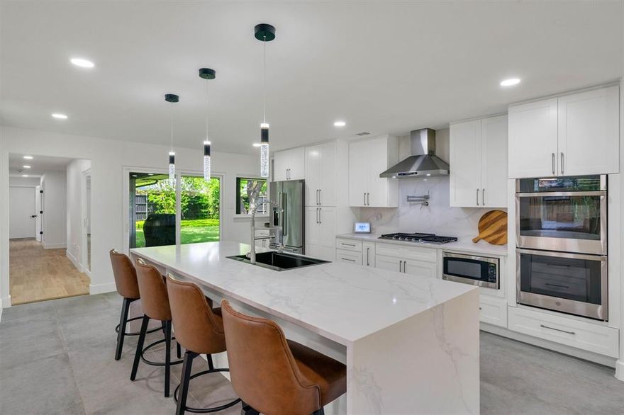 Welcome to a home that truly lives beautifully in the Glen Meadows neighborhood of the Private School Corridor. Thoughtfully reimagined down to the studs in 2024, including all-new plumbing, this four-bedroom, four-bath residence blends clean design with everyday comfort at every turn.

Step inside to discover a light-filled, open-concept design made for both everyday living and effortless entertaining. The heart of the home is a stunning chef’s kitchen, complete with a generous quartz island, custom cabinetry, and seamless flow into expansive living and dining spaces. Recent upgrades completed in October 2025 enhance the home’s livability even further, including a leveled living room for a more cohesive gathering space and a beautifully reconfigured fourth bedroom with its own ensuite bath.

The floorplan is both functional and inviting, offering a dedicated office, spacious secondary bedrooms, and a private primary retreat that feels like a true escape featuring a cozy fireplace, an oversized walk-in closet, and a spa-inspired bathtub with a dual rain shower.

Outdoors, the backyard offers a touch of charm and possibility, with a fruit-bearing pear tree and even the option to keep chickens—creating a rare blend of suburban sophistication and homestead appeal.

With its extensive renovations, thoughtful upgrades, and exceptional layout, this home is as practical as it is captivating. This home is ready to welcome its next chapter.