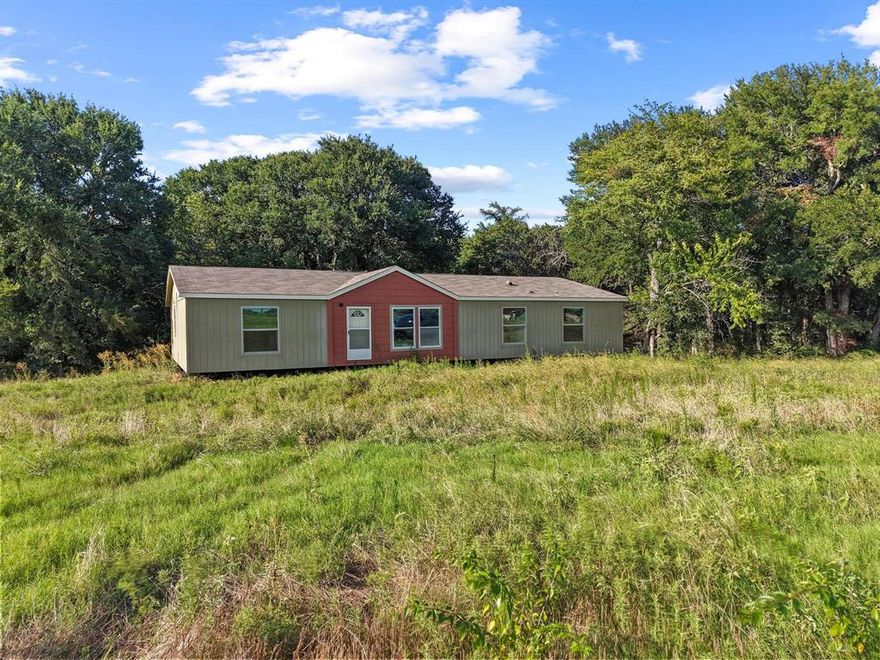 Three different Lots and homes available for sale.  Size ranging from 1800-2592
These home have never been lived in.  Financing and warranty options available.  
Newly available — three never-lived-in manufactured homes just outside Bonham city limits! No HOA, Bonham ISD, and only minutes from both Lake Bonham and Bois d’Arc Lake. A rare opportunity for homeownership or investment in a growing area. Financing and warranty options offered.
These homes will require some finishes, Utilities are available and at the edge of property, some deed restrictions,  these homes will require an aerobic septic