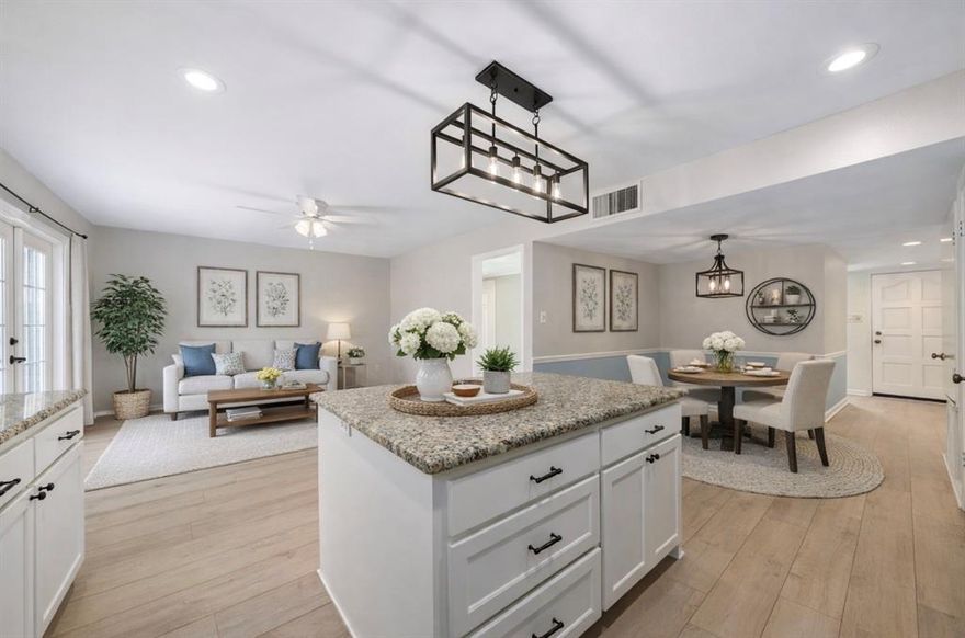 Updated and move-in ready! This beautiful single-story home in Coppell offers a light-filled interior, stylish finishes, and a functional open-concept layout. The gorgeous updated kitchen features crisp white cabinetry, granite countertops, a classic herringbone backsplash, black hardware and fixtures, generous counter space, eat-in breakfast area, and kitchen island overlooking a second living area; a perfect layout for everyday entertainment and enjoyment. Wide-plank wood-like vinyl flooring and soft neutral tones flow through the main living spaces. The spacious family room showcases a brick fireplace and opens seamlessly to the formal dining area and kitchen. French doors lead to a nice back patio, covered patio, and oversized backyard with plenty of room to relax, entertain, or play and for pets. With attractive curb appeal and thoughtfully updated interiors, this home is ready to enjoy and offers quick access to dining and shopping! New sprinkler system front and back. New windows (previous owners had replaced a few, current sellers replaced others) Virtual tour and colored floorplan available!