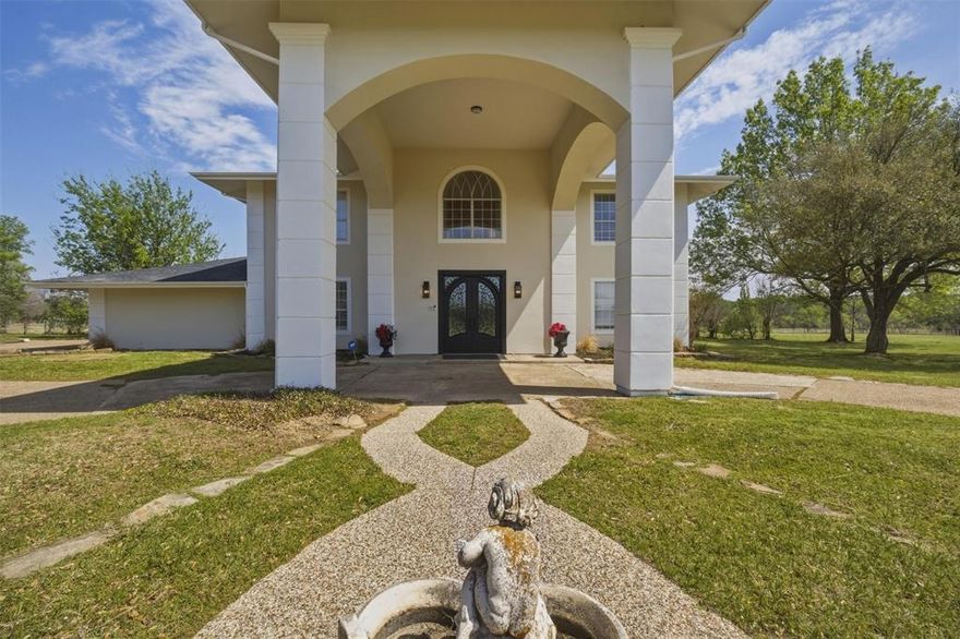 Beyond the gated entry, a sense of privacy and tranquility envelops this refined estate. Spanning over 5,000 square feet of thoughtfully designed living space, it boasts a resort-style pool and the rare freedom of Texas acreage. The grand foyer, with its soaring 30+ foot ceilings, immediately creates a sense of scale and light.

Strategically located between Lake Ray Hubbard and Lake Tawakoni, the property offers close proximity to Rockwall and Dallas. It’s also near Bishop Field (68TS) private airport in Royse City. The main residence, gracefully situated on approximately 3 acres, features expansive rooms, 10-foot-plus ceilings, and a flowing layout. This creates an atmosphere that’s equally suited for intimate everyday living or elegant gatherings. With 5 bedrooms and 3 full bathrooms, the home offers ample space, comfort, and versatility without compromising on sophistication.

What truly sets this property apart is the separately platted 1-acre parcel. This opens a world of possibilities that are rarely found at this level. Imagine a private guest house, a future residence, or the option to sell or hold the parcel as an investment. Alternatively, you could combine both parcels to enjoy a seamless 4-acre private retreat.

This estate is more than just a home; it’s a canvas for your vision, lifestyle, and dreams.