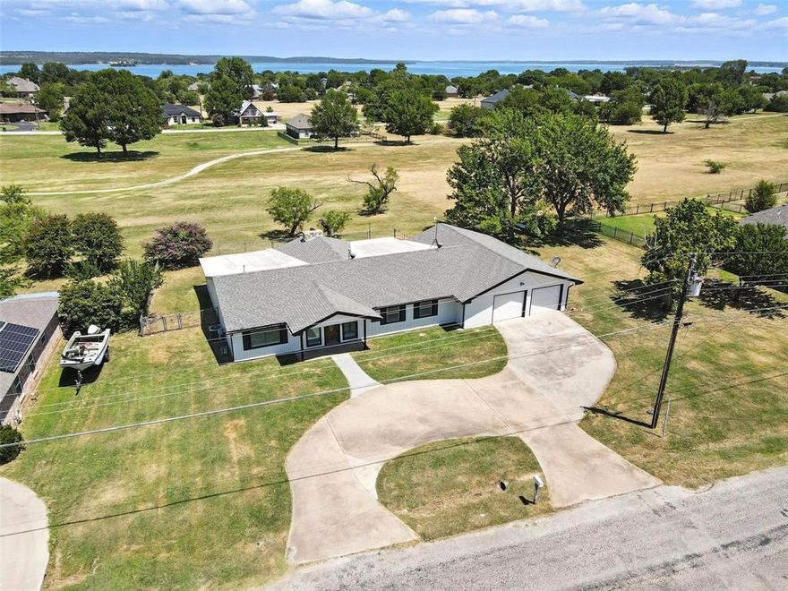 Great investment opportunity in Runaway Bay, TX.
236 Half Moon Way is a 3-bedroom, 3-bath, single-story ranch-style home on a large double lot (over 0.42 acres) in a lakeside community near Lake Bridgeport. The property is priced well below the tax appraisal and RealAVM and under $110 per square foot, offering solid upside potential for investors, buyers looking for a rental property, or value-focused owner-occupants.  Terrific deal for first time buyer!

The floor plan includes three living areas plus a flex room that can function as an office, hobby room, or additional living space. The kitchen is generously sized with a large walk-in pantry, and there are three full bathrooms to support multiple occupants or tenants.

Recent work includes interior and exterior paint and a new electrical panel. Other areas may need cosmetic updates or repairs, and the home is priced to reflect its current condition. The oversized double lot backs to the former golf course, providing open views with no rear neighbors, and the oversized garage offers additional storage or workspace. With its size, layout, and pricing, this property has strong potential as a rental, flip, or long-term hold in Runaway Bay.