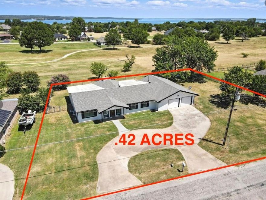 What a price! Great opportunity in Runaway Bay, Texas near Lake Bridgeport. 236 Half Moon Way is a single story ranch style home offering 3 bedrooms and 3 full bathrooms on a large double lot of more than 0.42 acres. Priced below the tax appraisal and RealAVM. Under 110 per square foot, this is a strong value for investors, buyers seeking a rental property, or owner occupants looking for upside potential.

Inside, the flexible layout includes three living areas plus a bonus flex room that can be used as an office, hobby space, or additional living area. The kitchen is generously sized and includes a large walk in pantry. Three full bathrooms provide added convenience for multiple occupants or guests.

Recent updates include fresh interior and exterior paint and a new electrical panel. Additional cosmetic updates or repairs may be desired, and the pricing reflects the current condition.  Home could use some new flooring in certain areas. 

Enjoy open views and privacy with a backyard that backs to the former golf course and no rear neighbors.   Plenty of room for boat, parking, RV parking, adding a workshop, or even a pool.  The oversized garage offers excellent storage and workspace. With its lot size, versatile floor plan, and attractive pricing, this home offers strong potential for a rental, remodel, flip, or long term hold in Runaway Bay.