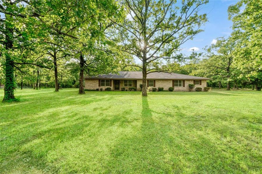 This beautiful 4 bedroom, 3 full bathroom, 2600+ square foot home is looking for its new family! Two bedrooms boast their own ensuite bathrooms, with a bathroom just outside the entry of the third bedroom. The fourth bedroom could be used as a bedroom or game room, as it is the largest of them all! Just behind the garage sits a detached, one bedroom, one full bathroom, recently-renovated guest house; set up nicely for visiting family or multi-generational living. For the handy-man or hobbyist, the 30x50 shop sits on a slab, has two 10-foot roll-up doors, built in shelving and a stove heater for winter work. 6+ acres attached to the improvements in this tract, and an additional 8+ adjoined acres available to go all-together if desired. Information on the additional acreage available upon request.