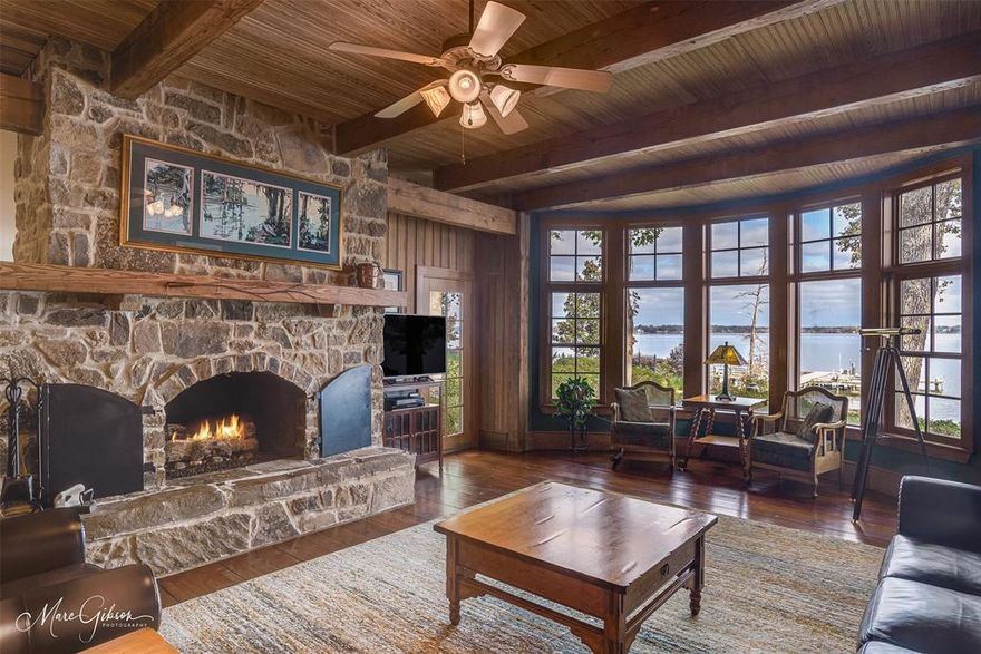 One-of-a-kind architect-designed waterfront estate on a stunning 1.38-acre peninsula lot with some of the longest unobstructed views on Cross Lake. Custom-built single-owner home with 3,380 heated sq ft and extraordinary craftsmanship including antique reclaimed wood from a historic Shreveport warehouse, solid-core doors, Adirondack Naturals doors, insulated, metal-clad wood windows by Vetter and 10 ft ceilings with a soaring 17 ft 4 in vaulted Great Room. East-facing orientation provides breathtaking sunrises and moonrises, natural shade in the afternoons, cooling south and east breezes and exceptional storm protection. Outdoor living includes a two-level deck with a functional hot tub, screened porch with built-in vent hood and space for grilling, flagstone firepit with 180 degree open-water views and a 125 ft engineered pier with two 3,000 lb boat lifts, jet ski lift, docking for a 24 ft party barge, water access, underground drainage and utilities in place for a future boathouse. The chef’s kitchen features black granite countertops, all pull-out cabinetry, multiple appliance garages, Sub-Zero and Dacor appliances including convection oven, 50 lb ice maker, excellent pull-out vent hood, trash compactor, walk-in pantry and lake views. The primary suite includes a two-person shower, walk-through closet to laundry and built-in ironing board.  The home includes a post-tension slab, heavy-duty Z-wall retaining system with French drains, future elevator shaft, oversized garage with storage rooms, whole-home generator, bug misting system, thick exterior walls for high efficiency, underground drainage to the pier and lake-fed irrigation. A rare opportunity to own a master-crafted estate with unmatched privacy, water frontage and panoramic lake views. Please see the list of features and more information attached.