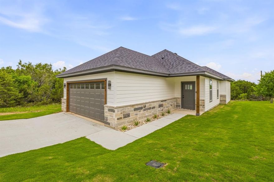 New construction in Canyon Creek, a gated community in Granbury, Texas, just minutes from the historic Downtown Granbury Square and Lake Granbury. This brand-new home offers modern finishes, an open-concept layout, and low-maintenance living in an established neighborhood with community amenities. Conveniently located near shopping, dining, entertainment, and lake activities, this property is ideal as a full-time residence, weekend getaway, or investment opportunity.