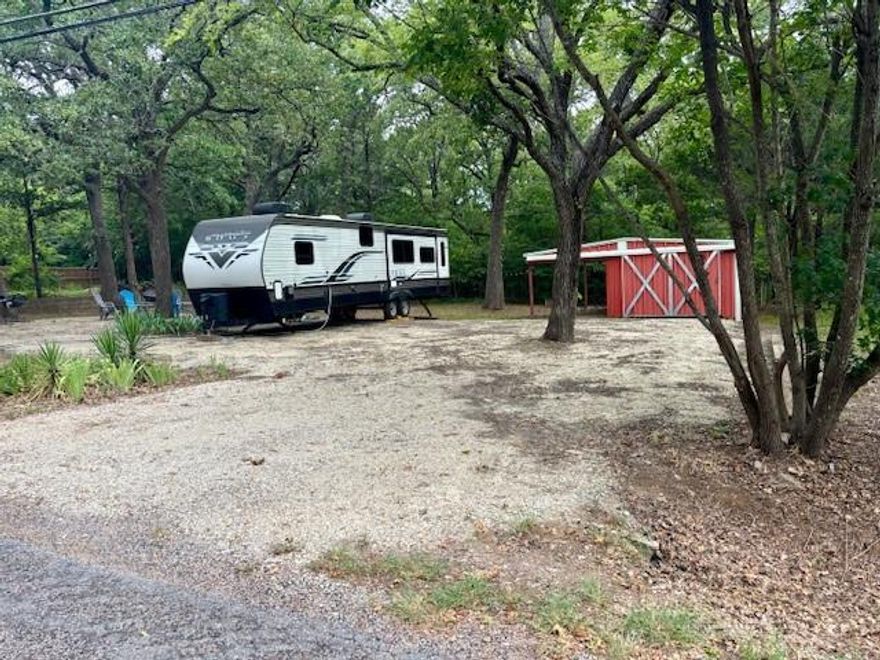 2 Lake Lots being sold together in Sherwood Shores totaling 0.23 acres, along with the option to buy this incredible 2022 Palomino Puma Camper! Property Has been Cleared with Water and Electric available on the property. Storage Shed with with a Lean-to for all of your tools and Equipment! Retaining wall on the west side of the property.