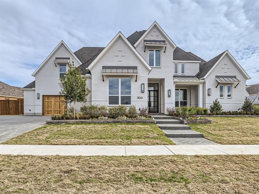 This gorgeous 2 story home features 5 bedrooms, 5 full baths, 2 powder baths, an outdoor pool bath, study, game room, media room and a 4 car garage. Walk in closets, ample storage and designer finishes throughout.