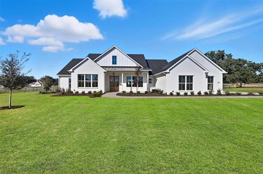 Beautiful New Construction Modern Farmhouse on 1 Acre – No HOA! Fully Fenced Backyard! Outside City Limits! Builder offering $20,000 concessions towards closing cost, rate buy down, or additional upgrades if under contract by December 31st, 2025!

Stunning and move-in ready, this gorgeous white brick modern farmhouse sits on a spacious 1-acre lot in the highly desirable Springtown ISD, just outside city limits with no HOA. Designed with both elegance and functionality in mind, this 4-bedroom, 2.5-bath home offers a wide open floorplan, perfect for everyday living and entertaining.

Step inside to find unique black and gold fixtures and hardware, modern appliances, and spacious walk-in closets throughout. The living area features a sleek modern electric fireplace and large windows that bring in abundant natural light. The kitchen and bathrooms boast high-end finishes and designer touches that make this home truly one-of-a-kind.

Outdoors, enjoy a fully fenced backyard with durable pipe-and-no-climb fencing, a large covered back porch, and a professionally upgraded landscape including Bermuda sod, a sprinkler system, and newly planted trees. The extra-wide driveway adds convenience and ample parking space.

Don't miss your chance to own this thoughtfully built home with luxury touches throughout – all in a peaceful, unrestricted setting!

Move-In ready 10-15-25!