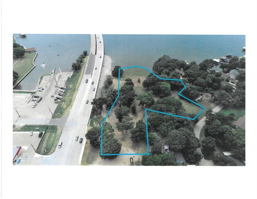 PREMIER COMMERCIAL OR MULTI-FAMILY RESIDENTIAL LOCATION IN GUN BARREL CITY. THE 2.35 ACRE WATERFRONT TRACT ON WIDE OPEN WATER IS PERFECT FOR A VARIETY OF BUSINESSES OR MULTI-FAMILY USES. HAS APPROX. 186 FEET OF WATERFRONT. PROPERTY SITS HIGH FOR INCREDIBLE SUNSETS. HAS ADDITIONAL LOTS ACQUIRED FOR PARKING.