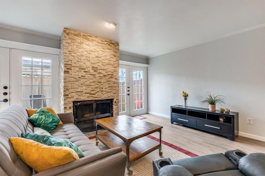 This beautifully updated condo is perfectly situated in the heart of Oak Lawn, offering the ideal blend of comfort, style, and unbeatable convenience. Enjoy secure gated access and a prime location just moments from top-rated dining, vibrant nightlife, and highly desirable and effortless commuting via the nearby Dallas North Tollway, I-35, Woodall Rodgers and minutes from I-30 and US-75. 

Inside, the kitchen shines with stunning granite countertops and freshly painted white cabinetry, creating a bright, modern feel. The living room features a striking floor-to-ceiling stone fireplace, new LVP flooring, a mini dry bar with access to water and two sets of French doors that open to a private outdoor entertaining space—perfect for relaxing or hosting guests.

Upstairs, you’ll find two spacious bedrooms with generous closet space, along with a stackable washer and dryer that convey with the unit for added convenience.

This is city living at its best—stylish, low-maintenance, and close to everything you love.
