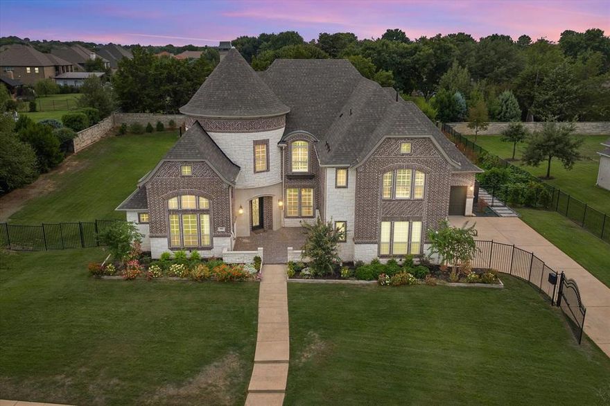 Southlake’s Shady Oaks boasts this impeccable modern interior estate situated on a sprawling homesite with total backyard privacy.  Fashioned to offer privacy with the perfect  blend of spaciousness, and entertainment possibilities. As you approach the property, you'll be greeted by an elegant façade, featuring meticulous landscaping and a grand entrance that sets the tone for the living experience that awaits within. The main living area seamlessly flows into the gourmet kitchen, where the chef in your family will feel right at home with a double island and state of the art appliances.  Large windows throughout the home bathe the interior in natural light and views of the lush backyard oasis perfect for outdoor enthusiasts and entertainers alike. This space overlooks a picturesque pool with waterfalls , inviting you to take a refreshing dip or bask in the sun. Southlake Carroll schools are just around the corner for biking or walking or a short bus ride and blocks from Town Square WOW