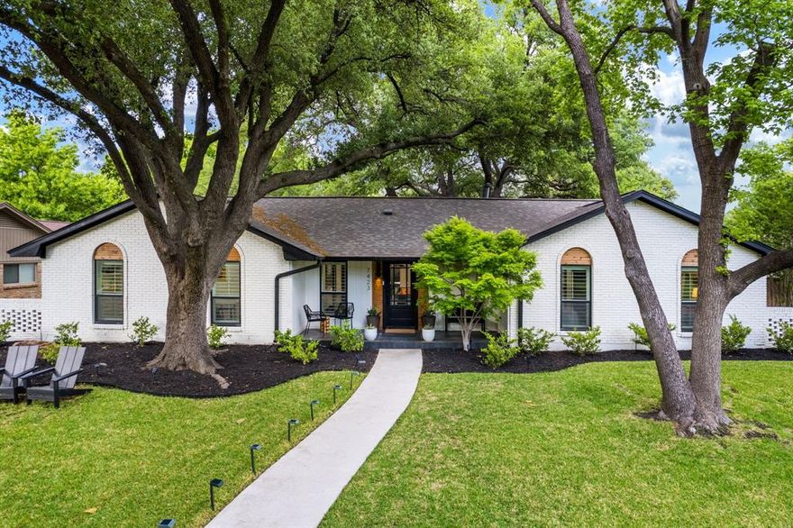 Located in the heart of Prestonwood and zoned to highly regarded Richardson ISD—Spring Creek Ele, Westwood Junior High, and Richardson High, this thoughtfully redesigned and fully updated home has a compelling blend of style, function, and everyday livability. Set on an oversized .26-acre lot with mature trees and wonderful curb appeal, and a welcoming front porch! This home opens to a warm, design-forward interior, with elevated choices in fixtures. Wide-plank wood floors run throughout, complemented by a neutral color palette with contrasting dark painted interior doors for a clean, cohesive look with wide trim and built-in details. The open-concept layout is anchored by a well-appointed chef’s kitchen with quartz countertops, a large island with seating, high end appliances including a 36-inch gas range, pot filler, and generous storage, perfect for entertaining. In the adjacent family room are vaulted ceilings with a wood beam, a fireplace with built-ins, and seamless connection to the outdoor living spaces. A standout feature is the indoor-outdoor flow, with the living, family, and primary suite all opening to a private backyard and patio—creating a natural extension of the living space. The primary suite is a true retreat, complete with a spa-inspired duel shower, soaking tub, dual vanity, closets, and elevated finishes. Secondary bedrooms are well sized for kids and provide flexibility for guests or a home office. Located near neighborhood schools, parks, Preston Ridge Trail, and convenient to nearby shopping and dining favorites in Hillcrest Village and Addison. Also near major commuter route, the Dallas N Tollway and 635. This move-in ready home offers the ease of one-level living suited to every stage of life! It's set in one of North Dallas’ most established and enduring neighborhoods, delivering a strong balance of warm modern design, location, and long-term value. Home was fully renovated in 2024, with all systems updated. Schedule a showing today!