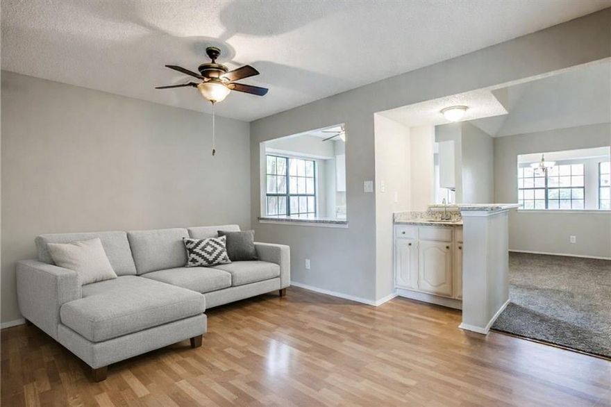 Welcome to this charming 3 bedroom, 2 bath single story ranch style home offering a spacious and functional layout perfect for everyday living and entertaining. This open floorplan features two living areas and two dining areas, providing flexibility for formal gatherings, a home office, or a game or media room. The secondary living room includes a built-in wet bar, ideal for hosting guests and creating the perfect entertainment space. The desirable split bedroom floorplan offers added privacy, with a generously sized primary suite separated from the secondary bedrooms. The kitchen opens to the main living and dining spaces, allowing for easy flow and natural light throughout the home and has granite countertops and stainless steel applicances. Step outside to relax in your private backyard retreat featuring a stand-alone spa-hot tub, perfect for unwinding after a long day. This property combines comfort, versatility, and classic ranch-style appeal, a great opportunity for buyers seeking space, functionality, and entertaining potential.