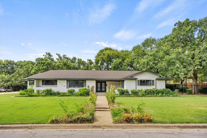 Discover this stunning five-bedroom ranch-style home, impeccably updated and ideally located near DFW Airport and major sporting venues. Every detail has been thoughtfully renovated, from the beautifully remodeled bathrooms to the stylish designer walls. The private master en-suite bathroom is a luxurious retreat, featuring a soaker tub for ultimate relaxation. Step into the heart of the home, where the completely updated kitchen showcases modern elegance and functionality. The new floors throughout the house enhance its contemporary appeal. Grab your cup of coffee or glass of wine and cozy up by one of the two fireplaces. Outside, enjoy the perfect patio with a charming pergola, creating an ideal space for outdoor entertaining or peaceful relaxation. In addition to all the interior upgrades, also added was a brand new sprinkler system! This gem is walking distance from AA Education Ctr which makes this home an ideal AirBnB or short term rental for pilots or airline stewards.