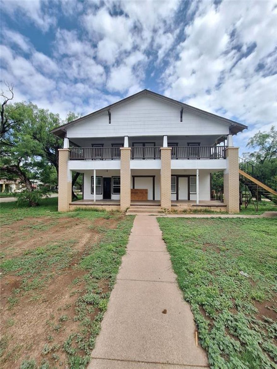 Big bedrooms, large living area, updated laminate wood flooring, lots or room! Kitchen has electric stove and refrigerator.  Central heat and air, extra high ceilings, lots of windows, covered front porch.  There is a easy access wheel chair ramp from the parking lot to the large front porch.