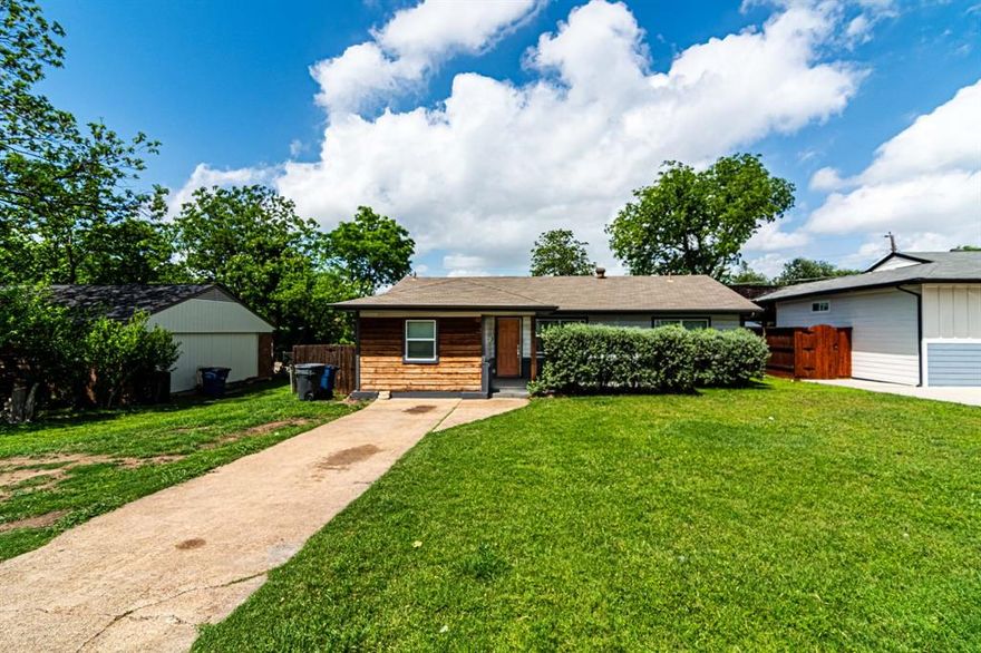 Welcome to this 4bed-2bath home with modern cedar siding and a backyard patio deck. The primary suite is large with ensuite bath featuring, tile shower-bath and a single granite vanity. The layout gives easy access between the kitchen and living room. The kitchen features granite counters, ss appliances, cabinets, a utility closet for stacked washer and dryer and an attached dining area for family dinners. The layout is finished with 3 accessory bedrooms and a hall bath featuring granite vanity and bath-shower. The backyard features a large treated wood deck patio, perfect to enjoy the nice Texas evenings. Also featured in the backyard is a storage shed perfect for all your outdoor storage needs. Carpet, tile and wood flooring throughout. Located minutes from the trendy Bishop Arts District of Dallas and loop 12, I35 & I30 which opens up to the greater DFW metroplex. Shopping, entertainment and restaurants are just minutes away. Don't miss out!