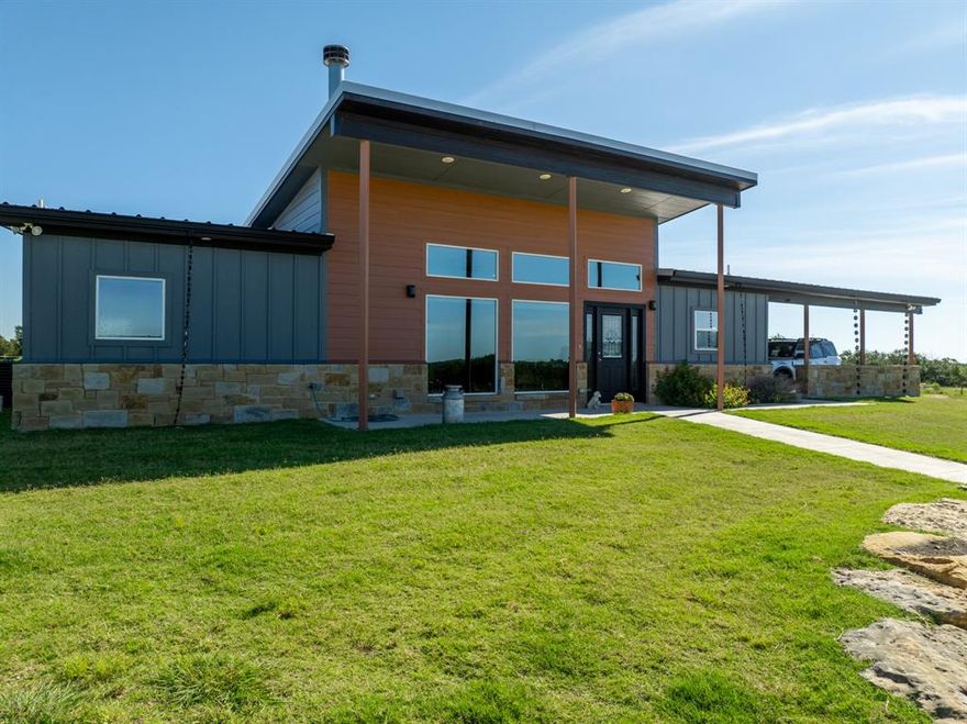 25± Acres with Modern Home & Horse Facilities – Purmela, TX
Welcome to peaceful country living at 750 CR 100, Purmela, TX. This 25± acre horse property features a 2-bedroom, 2-bath home built in 2021, offering modern comfort, quality finishes, and room to enjoy the outdoors.
The home showcases an open floor plan with stained concrete floors, high ceilings, and large living-room windows that bring in natural light. The kitchen is designed for both function and style with a large island, granite countertops, country sink, pantry, and ample cabinet space throughout. Both bathrooms feature double vanities, walk-in showers, and the bedrooms offer large walk-in closets. The laundry room includes a granite countertop and sink for added convenience. Enjoy evenings on the covered back porch or relax in the hot tub. An attached 2-car carport with storage completes the home.
Outside, the property is well-improved with a horse barn, storage building, and covered RV storage with electrical hookups. The electric front entrance gate and wooden panel entrance with a two-rail fenced lane create a welcoming approach to the home. The land offers rolling terrain, good tree cover, and a stock tank, making it an excellent setup for horses or livestock.
Located on a paved county road with a multi-county water meter and within Gatesville ISD, this property is approximately 10 minutes from Coryell Health Hospital, 15 minutes from downtown Gatesville, and about one hour from Waco, Temple, Killeen, and Stephenville.
If you’re looking for a move-in-ready home with acreage and quality horse improvements, and quick access to a major hospital, this Purmela property checks all the boxes.