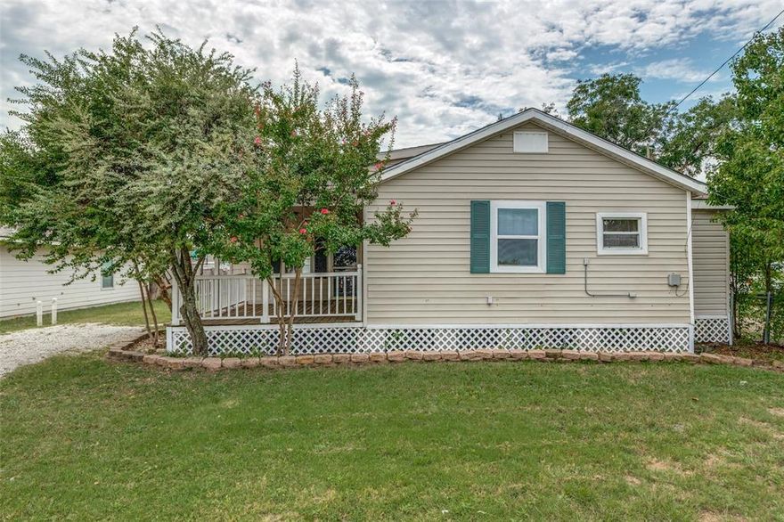 Great opportunity for a first-time buyer or investor! Charming, updated home on an oversized .26-acre lot located in the heart of Historic Downtown Celina with strong growth potential. Features a large combined living and dining area with crown molding and updated trim, plus a bonus flex space ideal for a home office. Updated kitchen and bathroom, two spacious bedrooms (main bdrm has exterior door access to porch) with walk-in closets, wood-look laminate flooring, and fresh interior paint throughout. HVAC replaced in 2023. Exterior highlights include a carport and storm shelter in the backyard. Foundation repairs needed; seller willing to complete repairs with acceptable offer. Convenient location within walking distance to downtown shopping, dining, and future development.