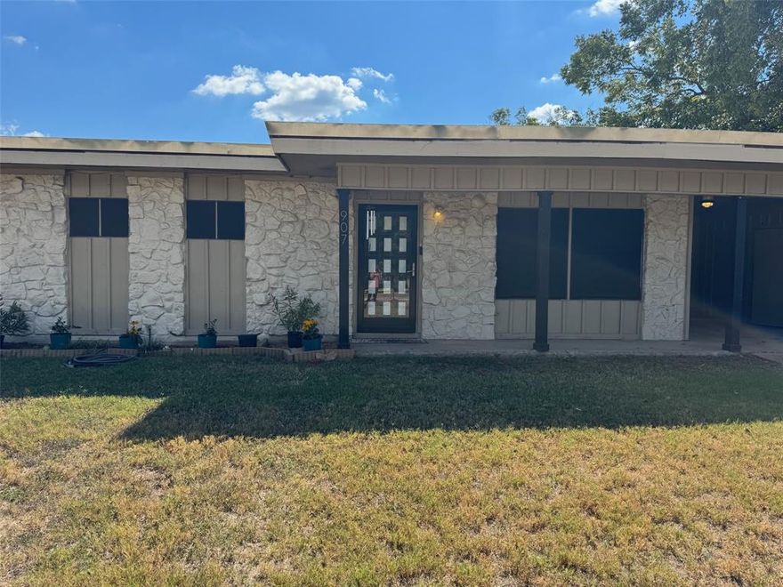 Don't let the City street work get in the way at making this amazing home your dream home.  City is making lots of progress and should be done soon.  If you are looking for a large home with lots of bedrooms, square footage and endless possibilities,  then this could be just the one for your family. Property sits on an amazing oversized corner lot in a quite established neighborhood that has a fenced in back yard. Nice covered back porch.   Location is close to the Historic Granbury Square, restaurants, shopping and schools.  Two separate driveways that are covered and plenty of room for additional parking.  Storm shelter.  One car garage that can be used for a vehicle or for  extra storage. Good sized living room and an additional bonus room that could be additional living space, play room or exercise room.  Dining area provides a nice ambiance with a wood burning fireplace. Kitchen offers an abundance of cabinets, double stainless steel ovens, stainless dishwasher and a 5 burner cooktop stove.   Seller does not have a survey.  Buyer will need to purchase.  Seller prefers to sell the property As Is.