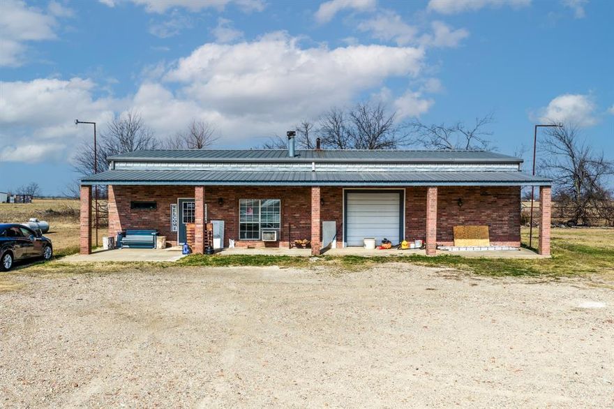 5.636 acres with State Highway frontage and excellent visibility on one of the city’s highest-traveled roads. Convenient access to I-30. Property includes a 2,100 SF (70' x 30') metal building that is fully heated and cooled featuring a 30' x 30' pull-through warehouse, 30' x 30' main area, kitchen, office, and bath. Second 768 SF building offers flexible use as office, rental, or potential living space. Prime location near airport, hospital, industrial businesses, and Lake Sulphur Springs. Ideal for commercial, industrial, or investment use.