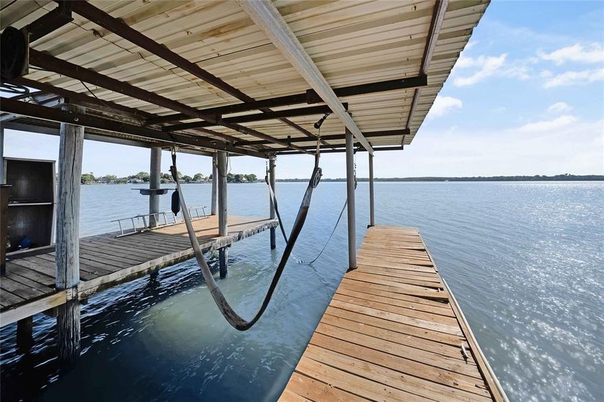 Lakefront Living Meets Investment Opportunity on Eagle Mountain Lake!
Welcome to your chance to own a true waterfront lifestyle property—where everyday living feels like a vacation and short-term rental potential creates exceptional income possibilities.
With its private boat dock, breathtaking sunrise views, and direct lake access, this home is perfectly positioned for high-demand Airbnb or VRBO opportunities. Lake properties with private docks are rare and highly sought after—making this not only a personal retreat but a smart investment in one of North Texas’ most desirable lake communities.
Behind the electric gate and privacy fence lies your secluded escape. The backyard is built for unforgettable lake weekends—mature trees, generous green space, and peaceful waterfront views create the perfect setting for entertaining, sunset gatherings, or hosting guests seeking the ultimate lake getaway.
Inside, the home blends comfort and style. The kitchen features granite countertops, stainless steel appliances, and contemporary shelving—ideal for hosting or accommodating short-term guests. A newer AC unit ensures comfort during warm Texas summers.
Imagine the possibilities:
• Morning coffee overlooking the water
• Fishing and boating from your private dock
• Weekend rentals generating income
• Full-time lake living just minutes from the city
Whether you’re looking for a waterfront retreat, vacation home, or turn-key Airbnb investment, this property offers flexibility, privacy, and long-term potential.
With an acceptable offer, the seller will include the refrigerator, sofa, dining table and chairs, all dressers (including black ones in the second bedroom), outdoor furniture, bedroom furnishings (excluding decor), plus washer and dryer—bringing you closer to a ready-to-go short-term rental.
Lakefront properties with income potential are rare. Don’t miss your chance to own a private piece of Eagle Mountain Lake.