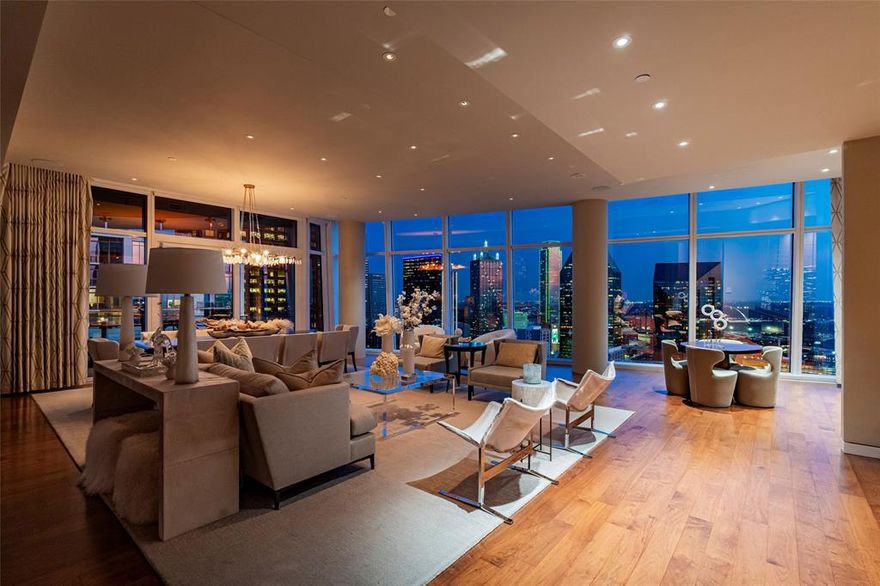 Exceptional opportunity to live in a completely customized one of a kind floor plan inside iconic Museum Tower. Available with beautiful, custom furnishings.  Open Living Dining with dramatic views of downtown seen through floor to ceiling glass windows. Perfect flow allows guests privacy at one end of the home.  Separate large, open Study. 
DUAL PRIMARY BATHROOMS AND CLOSETS that provides coveted privacy and generous storage. Comfortable media den with a fireplace adds to the warm and inviting feeling with a casual yet sophisticated vibe. Kitchen showcases Pro style Wolf, SubZero, & Miele appliances clad in beautiful custom cabinetry.