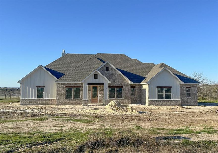 BUILDER INCENTIVE-$20k to buyers, to be used as they please-buy down the mortgage rate, reduce the contract price or apply toward closing costs. Built by Dalton Homes-Sitting on 2.21 acres with 4BR , 3 FULL BA & approx. 2649 ft.² of living space, this new construction farmhouse style home features an open concept floor plan blending functionality with style. This home highlights Quartz kitchen counters, Shaker style cabinets, eat-in island, decorative tile backsplash, stainless steel appliances, built-in cabinets, wood headers, wood burning fireplace, utility room & a mud bench. The primary suite is a generous retreat with a huge dreamy closet & a super relaxing bathroom with a large soaking tub. Secondary bedrooms are spacious in size. The gorgeous backyard highlights a covered porch with a ceiling fan & features a tank, creating a tranquil atmosphere. Oversize 3-car garage. AT&T fiber, Aerobic septic & a personal water well! NO WATER BILL! Zoned for the highly coveted Brock ISD.