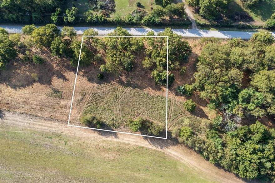 Build your vision on this 1.01-acre tract in the growing community of Collinsville, Texas. Enjoy the perfect balance of country living with convenient access to town, offering plenty of space for a custom home, shop, or outdoor living features. Light restrictions are in place—no mobile homes allowed—helping preserve long-term value and a well-maintained setting. Located outside city limits with no HOA, this property offers peaceful surroundings, open skies, and room to spread out. The lot sits approximately 1.5 miles off FM 902 and just 3 miles from the proposed North Dallas Tollway extension, making it a strong future-growth location. Water and electric are available at the road. Seller also has an adjacent 1.01-acre tract available for purchase.