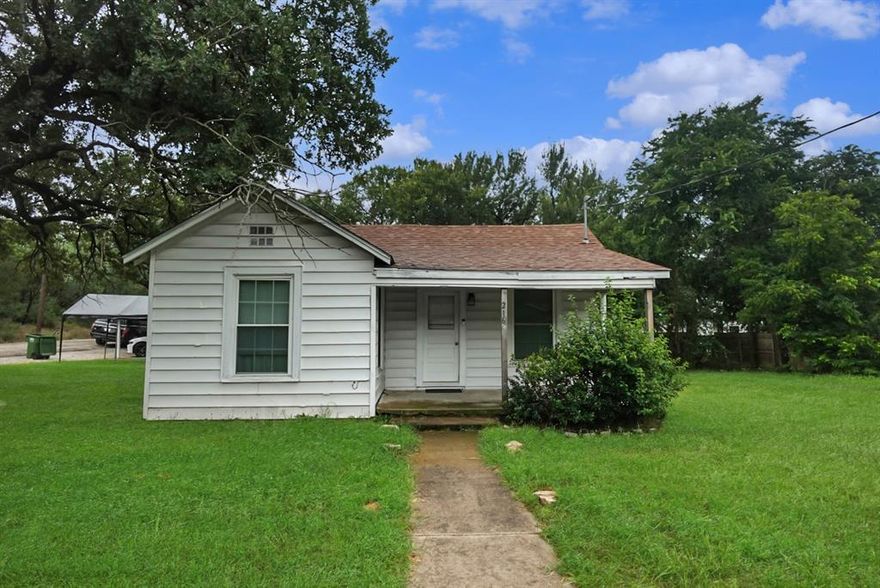 Charming and move-in ready, this adorable two-bedroom, one-bathroom home sits on a spacious corner lot and offers comfort, convenience, and character. Step inside to find beautiful laminate hardwood flooring throughout, creating a warm and welcoming atmosphere. The updated kitchen comes fully equipped with sleek stainless steel appliances—including a refrigerator, stove, and dishwasher—making meal prep a breeze. Enjoy the ease of a separate carport that provides covered parking and additional storage potential. Perfect for first-time buyers, downsizers, or investors!