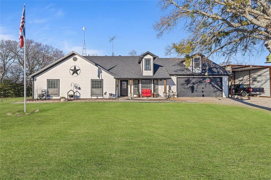 NOT IN CITY LIMITS OF PRINCETON!! Hidden on 22 breathtaking acres in Princeton, Texas, this property is a rare gem for those seeking space, privacy, and country charm. The 2,296 sq. ft. main house features three spacious bedrooms, two and a half baths, and a cozy, farmhouse-inspired interior. The primary bedroom and one of the secondary bedrooms include walk-in closets, offering ample storage and convenience. The living room is equipped with surround sound speakers, creating a perfect space for entertaining. Outside, a covered patio with additional speakers overlooks the serene landscape, complete with a hot tub that stays with the home. For equestrian enthusiasts, the property boasts a 10-stall barn with plenty of room for horses, while the expansive acreage is home to abundant wildlife. Scattered throughout the land are multiple mature pecan trees, offering shade and a picturesque setting. A versatile 1600 sq ft 40x40 structure provides endless possibilities—it can serve as a guesthouse, workshop, or additional living space. The home is wired for a generator, ensuring peace of mind, and the oversized garage is a dream workspace, featuring 110-volt plugs every eight feet. Whether you’re looking for a private retreat, a horse property, or simply room to roam, with no restrictions, this stunning 22-acre estate offers the best of country living with modern conveniences. 11 acres of the property is AG EXEMPT!