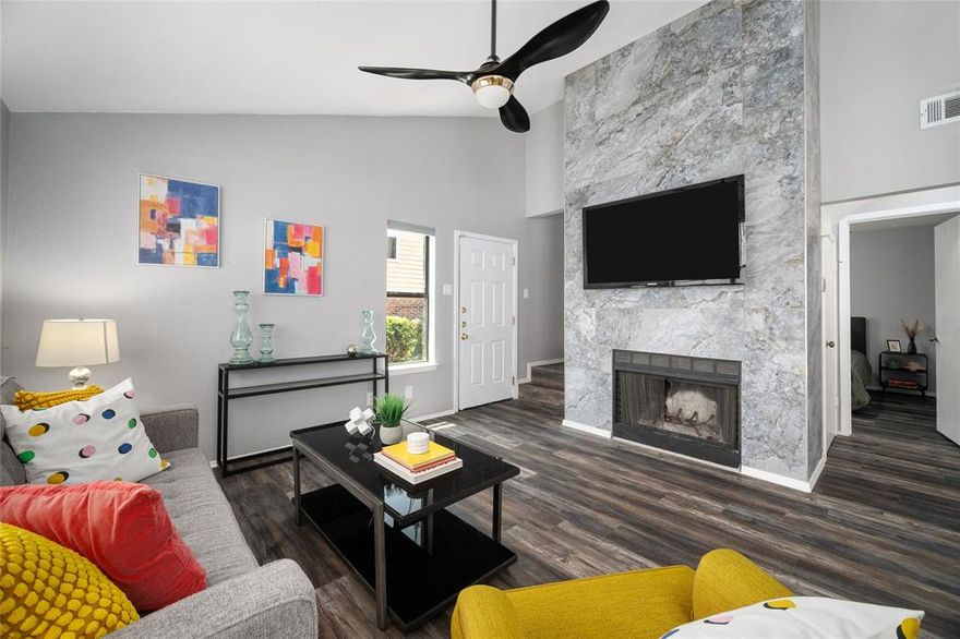 Beautifully remodeled 2-bedroom, 2-bathroom condo in Prime Carrolton location. The open-concept living area features vaulted ceilings, abundant natural light, and a cozy tile fireplace. The adjacent dining space leads to a sleek kitchen with gray cabinets, stainless steel appliances, and chic countertops. Spacious primary suite, complete with a spa-like bathroom featuring a walk-in shower and designer touches. The second bedroom is equally impressive, offering flexibility as a guest room or home office. Both bathrooms have been meticulously remodeled to offer a luxurious feel. Step outside to the private patio, where you can enjoy your morning coffee. The outdoor space is low-maintenance, making it perfect for those who love a relaxed lifestyle. Community pool and clubhouse. Located close to shopping, dining, and entertainment options, with easy access to major highways. Fridge, Washer and Dryer included. Monthly HOA fees cover water, sewer, trash & exterior maintenance.