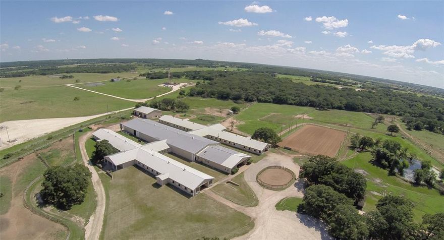 Superior equine facility with everything a horseman would want. Presently this exquisite property is a well known training and breeding facility. A new buyer can choose various uses in the equine industry. This facility can function for any breed or discipline. There is a charming 4 bedroom, 4 bath home on the property. The updated eat-in kitchen has granite counters and stainless appliances. Enjoy the scenic views, floating in the sparkling pool. Also wonderful two bedroom A- Frame.