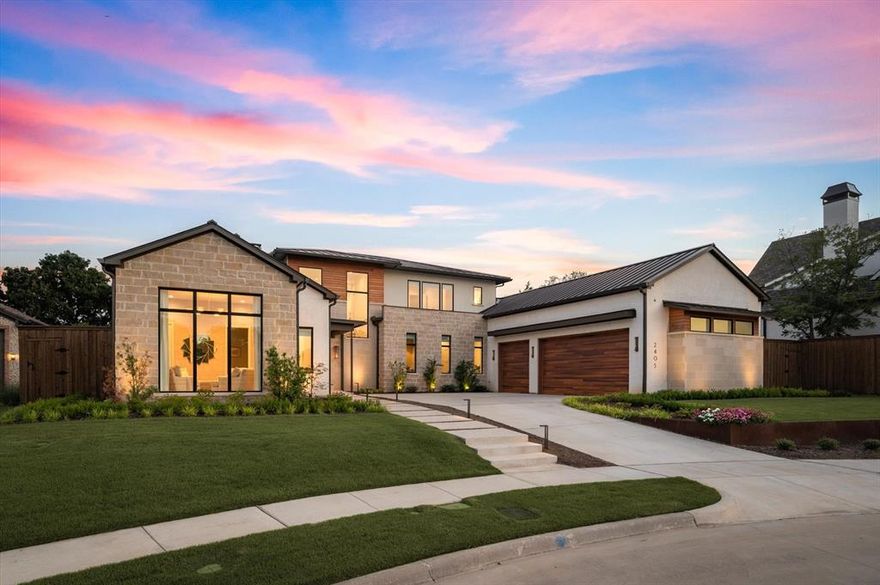 Nestled in the prestigious Stony Brook Addition of Southlake, this extraordinary home is a stunning blend of luxury, functionality, and timeless design. From the moment you step inside, you’ll be captivated by the attention to detail and the seamless layout that caters to both everyday living and grand entertaining. The open floor plan creates a natural flow between spaces, with large windows bathing the home in an abundance of natural light. Every room is thoughtfully designed to balance elegance and comfort, making this home as inviting as it is impressive. The much sought after feature of primary and guest suites down amd split for privacy and the utmost of features from stand alone tub and spa type features.  In accition,  a full media room on the first floor with exterior patio access makes for great entertaining spaces. The finish-outs throughout the home are nothing short of exceptional. From the hardwood floors to the intricate moldings and designer lighting fixtures, no detail has been overlooked. The gourmet kitchen is a chef’s dream, equipped with premium appliances, custom cabinetry, and an oversized island that serves as a centerpiece for both cooking and gathering. Hidden just behind the main kitchen is a catering kitchen, offering additional prep space and storage—an ideal setup for hosting sophisticated dinner parties, holiday celebrations, or large family gatherings. 
The south facing backyard offers over 600 feet of open patio space shielded from our Texas sun but with the warmth of a linear fireplace for the chilly evenings. This one-of-a-kind Southlake home truly has it all—combining modern luxury with thoughtful functionality in a way that sets it apart from the rest. From its impeccable design to its prime location in the sought-after Stony Brook community, this property is a rare opportunity to live in unparalleled elegance. Experience the perfect balance of beauty, comfort, and convenience in this remarkable Southlake gem!