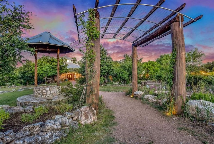 Located just 45 minutes from downtown Austin, 20 minutes from Hill Country Galleria-Bee Cave, and 30 minutes from Horseshoe Bay Resort and Marble Falls which is home to a 6,000 ft airstrip.
This property is the birthplace of the award-winning design firm Artistree Home and offers limitless potential for both personal enjoyment and business opportunity.
The gated property is bordered by the prestigious Austin Golf Club and is minutes from renowned vineyards, Lake Travis, and the future locations of Canyon Ranch — a luxury spa resort, and Thomas Ranch — a high-end community of retailers, dining, cultural experiences, and commercial spaces.
Located less than a mile from Highway 71, the property offers a secluded feel while still providing convenient access to all that Austin has to offer.
Tucked in the heart of Texas Hill Country, Cypress Creek Ranch is shaped by a spring-fed creek that winds through ancient cypress trees — some standing for over 800 years — before joining the Pedernales River-Lake Travis. The property features a spacious 4,400 sq ft ranch house, a 4,000 sq ft workshop, five enchanting treehouses perched above the creek, and seven glamping tents for a true outdoor getaway that offers endless ways to enjoy nature or build a thriving business.
A unique event venue sits among the trees, with a creekside amphitheater, floating platform, large pavilion with a stage, and caterer’s prep kitchen — ideal for weddings, concerts, yoga retreats, and corporate events. Throughout the property, you'll also find a tranquil onsen-style bathhouse, waterfall tub, two sparkling pools, a peaceful pond, farmland, equestrian amenities, multiple water wells, and high-fenced pastures where bison roam.

Acreage options include:  

22± unimproved acres: $1,950,000

Ranch Home and Venue on 10± acres: $3,000,000

Ranch Home and Venue on 10± acres with additional 22± acres: $4,500,000

Entire 104± acre estate: $10,000,000