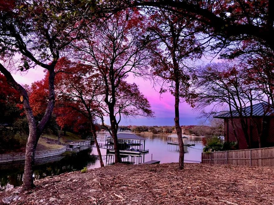 What has a nationally known architect as its creator, a pioneer of aviation as its owner, 5 minutes by boat to the famous Fort Worth Boat Club, over 2 acres waterfront (average on lake is .7 acres), 170' (average on lake is 100) frontage on the deepest slough on Eagle Mountain Lake and the closest location and street on EML to the Fort Worth lifestyle?? This property answers all those questions!
The interior is a clean slate to create a new masterpiece as the owners gutted a few years back and decided not to recreate but to sell to the next artist to put it back in its Glory Days. The song verse 'the sun poured in like butterscotch and stuck to all your senses' is a feeling that the owners and architect designed. What this 5,000 sqft, 4 bedrooms (more can be added), 4 bath, rolling 2.1 acres will be is only up to the new Buyer's creativity!. EML's premiere builder has spent time at the home and is excited to share his ideas. Imagine a walkout with pool, tennis, or pickleball courts, making this one of the most desirable homes on the whole of Eagle Mountain Lake. The street is tranquil, and hiking is recommended to experience a lake lifestyle. Take an 'As Is' and create a 'New Lake Front Estate IS'.
Some would call it 'As Sweet as Tupelo Honey'. Come Explore For Additional Benefits Hidden In Plain Sight.