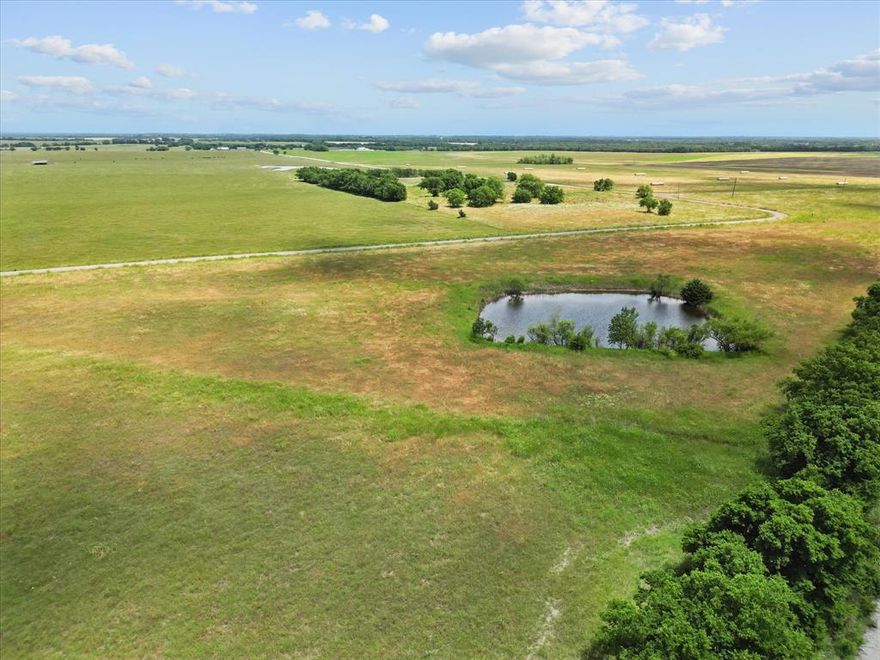 Just Under 1.5 Acres – Located in Hunt County Between Leonard & Celeste Looking for country living without being too far from the city? This beautiful tract offers just under 1.5 acres in a newly platted subdivision in Hunt County, ideally located off Highway 69 and County Road 1040. Enjoy the peace and quiet of small-town life while staying conveniently connected—only 15 minutes to Greenville, 40 minutes to McKinney, and just over an hour to DFW Airport. Electric poles have just been installed along the front of the property, making it ready for your next step. Situated in Celeste ISD, this property has minimal restrictions—bring your own builder, your own floor plan, or place a new double-wide manufactured home. Animals are welcome, giving you the freedom to create your ideal country lifestyle. The land is clean and open, located in a beautiful, well-kept area surrounded by large tracts that offer scenic countryside views. A small pond on the property adds both charm and functionality. Enjoy breathtaking sunrises and sunsets that stretch for miles, along with wide-open skies and peaceful, starry nights. With oiled road access and a tranquil rural setting, this property offers the perfect mix of serenity and convenience. Whether you're ready to build your dream home, bring in a new mobile home, or invest in land in a growing area, this property gives you the flexibility and space to create the lifestyle you’ve been dreaming of. Don’t miss this opportunity to own your piece of the country at an affordable price!