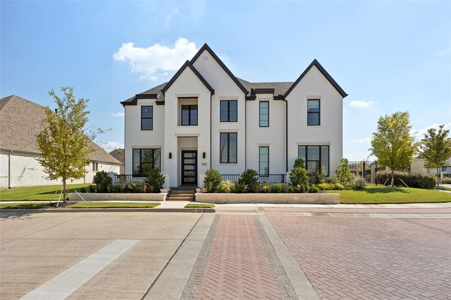 This contemporary waterfront home in the exclusive Viridian Island Community offers approximately 4,075 sq. ft. of thoughtfully designed living space with 4 bedrooms and 4.5 baths. Nestled on an exclusive 0.28-acre corner lot, the property showcases breathtaking water views and brilliant sunsets through dramatic floor-to-ceiling windows. The chef’s kitchen is a true centerpiece, featuring an oversized island, quartz countertops, premium built-in appliances, and a walk-in pantry containing refrigerator drawers, built-in microwave, and abundant shelving. A designer mudroom and a dedicated office nook off the kitchen add to the home’s functionality. The open-concept layout highlights beechwood oak hardwood floors and flows seamlessly to a covered patio, perfect for indoor-outdoor living and entertaining. The master suite serves as a private retreat, featuring a spa-inspired bath with soaking tub, frameless glass shower, and a custom walk-in closet. Each guest suite includes a private bath and blackout shades for comfort and privacy. A flexible upstairs bonus room provides additional living space—ideal as a media room, game room, or lounge. 
Smart-home technology elevates convenience with app-controlled blinds, electric shades, ceiling fans, and Gemstone holiday lighting. For eco-conscious living, the home features an owner-paid in full solar electric system and a container garden. The three-car garage includes epoxy flooring, garage attic storage and a 24-foot-deep bay for one oversized vehicle or additional storage. 
Residents enjoy Viridian’s resort-style amenities, including a Lake Club, Sailing Center, swimming pools, multiple parks, jogging and bike trails, tennis and pickleball courts —all minutes from shopping, dining, and entertainment.