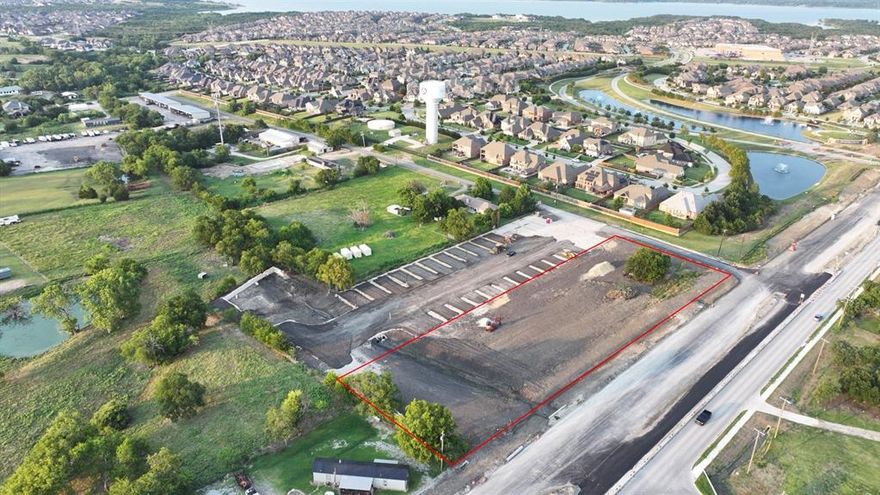 This rare 1.7-acre corner lot offers unparalleled potential in one of Collin County's most sought-after corridors along Parker Road. This unique property provides developers with a blank canvas for various projects. Whether you're looking to build retail, medical offices, industrial flex space, or recreational facilities, this unzoned land outside city limits offers the ultimate flexibility. Features:

Strategic Location: 450 feet of frontage on Parker Road. Adjacent to the Huffines-Inspiration master-planned community with over 2,500 homes. Convenient access with two TXDOT-approved commercial entrances on Parker Road. 

No City Oversight: Located outside city limits, eliminating city taxes, sales taxes, zoning restrictions, and city development regulations. Permitting is handled through Collin County.

Utilities and Infrastructure: 12-inch water line provided by Wylie Northeast SUD, bypassing city utility limitations. Sewer and water are available to the lot. The developer has already engineered and developed the Detention.

Development Flexibility: No height restrictions. Suitable for commercial projects such as convenience stores, retail strip centers, medical offices, industrial or flex space, and recreational facilities. Potential for a large electronic or static billboard on Parker Road frontage—unique to this area due to the absence of city limitations. 

Competitive Advantage: Neighboring towns like Parker and Saint Paul impose strict limitations on commercial development, ensuring limited competition. High barriers to entry and restrictions in surrounding communities make this property even more valuable. This is a rare opportunity to own one of the last remaining unzoned tracts along Parker Road, offering endless possibilities for savvy developers. Buyer's agent to verify all details in the listing. Owner already has stamped plans for 4 industrial flex buildings with approximately 16,000 sq ft. You can change it to whatever you see fit.