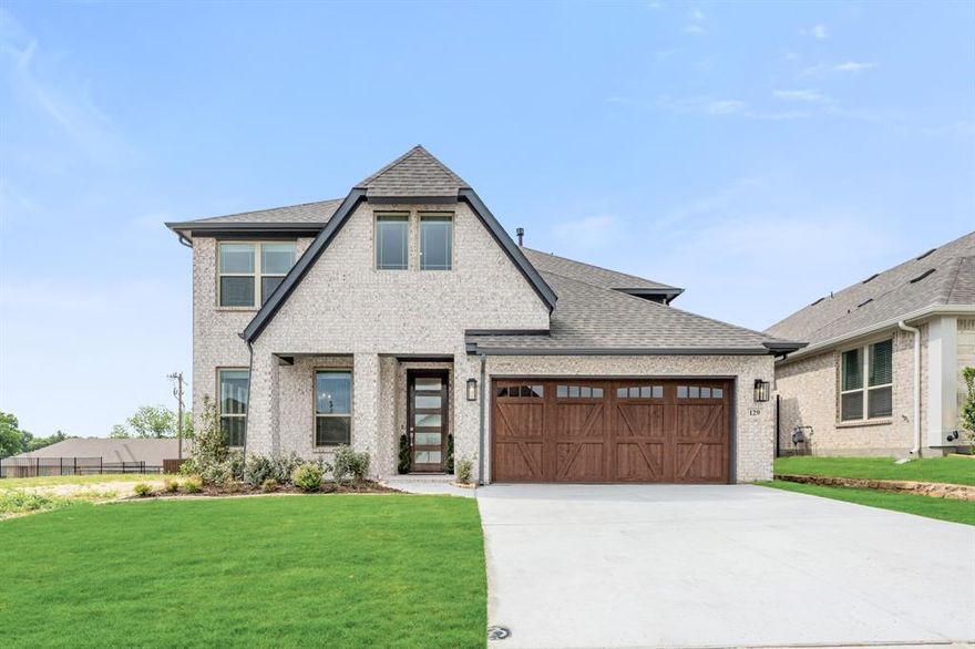 NEW! NEVER LIVED IN! Quick Close Available! This stunning 5-bedroom, 3.5-bathroom home with a 2-car garage by Bloomfield Homes blends exceptional style and everyday comfort in a spacious, modern layout designed for the way you live. From the moment you arrive, the show-stopping elevation and horizontal iron railings set the tone for elevated design. Step through the impressive 8' front door into an open-concept layout where vaulted ceilings, rich wood flooring, and large windows with window coverings fill the home with natural light. Off the foyer, a flexible dining room doubles as an optional study, while the open family room anchors the main level with easy flow into the kitchen and breakfast area. The chef’s kitchen is a standout, showcasing custom cabinetry, upgraded granite countertops, a deep walk-in pantry, and an oversized island that connects seamlessly to the dining and family spaces—perfect for both daily meals and entertaining. Tucked at the rear, the first-floor primary suite offers privacy with a spa-inspired bath featuring dual sinks, an upgraded shower, and a large walk-in closet. A convenient powder bath and laundry room are also located downstairs. Upstairs, 4 secondary bedrooms are arranged around a spacious game room, with a Jack & Jill bath connecting 2 bedrooms for added functionality and privacy, while the remaining bedrooms share a separate full bath. Each bath includes upgraded tile finishes for durability and style. Outdoor living is extended with an oversized covered patio complete with a gas stub for grilling, offering space to relax or entertain year-round. With high-end finishes, thoughtful upgrades, and a well-planned design that balances open gathering spaces with private retreats, the Bayberry III by Bloomfield Homes delivers the flexibility and comfort today’s homeowners need.
