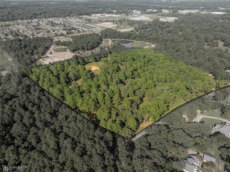 An extraordinary opportunity awaits in the prestigious gated community of Nob Hill in North Shreveport. This breathtaking 20-acre estate lot offers a rare combination of natural beauty, privacy, and exclusivity. Towering trees, natural springs, and panoramic views that stretch as far as the eye can see create a setting unlike any other, situated on one of the highest elevation points in the entire region. This property is more than land—it is a canvas for your vision, offering endless possibilities for creating a legacy estate or private retreat. A thoughtfully prepared house pad is already in place, providing a strong foundation to begin building the home of your dreams. With its unmatched location inside one of the area’s most coveted neighborhoods, this property offers not just space but a lifestyle defined by peace, prestige, and timeless beauty. Truly a once-in-a-lifetime chance to secure one of the most exceptional pieces of land available in Northwest Louisiana.