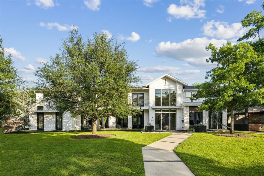 Modern luxury meets effortless living in this custom-built 2013 residence on over half an acre in prestigious North Dallas. Sunlight fills the open main level, where expansive living spaces flow into a gourmet kitchen with butler’s pantry and outdoor patio with fireplace. The primary suite is a private retreat with a serene bedroom overlooking the backyard, generous closet, and an adjoining office.

Curated amenities elevate daily life: a glass-enclosed wine room for celebrated bottles, a private gym, a dedicated office, a media room for movie nights, and a craft space to create and unwind. Step outside to a year-round oasis with a sparkling pool, relaxing spa, spacious patio, and lush, manicured landscaping designed for gathering and quiet moments alike.

Upstairs offers three en-suite bedrooms, a versatile playroom, a walk-in attic, and a flexible bonus room that could be converted into a fifth bedroom. Built to Green Built standards, this energy-efficient smart home also includes a three-car garage, reverse osmosis water filtration, a built-in storm shelter, and extensive custom features throughout.

Sophisticated yet welcoming, this is a rare opportunity to own a home that elevates everyday living—and makes entertaining feel effortless.