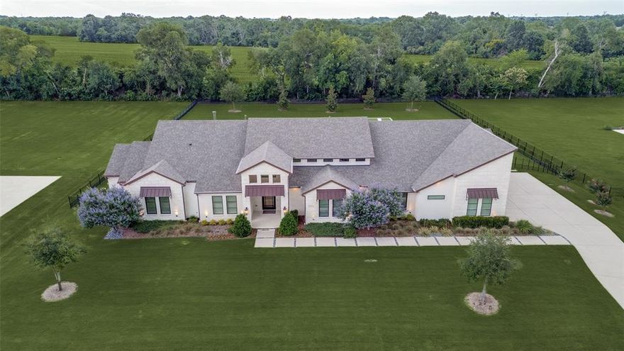 Welcome to one of the most exceptional single-story pool homes in the gated community of Hidden Creeks Pointe. This property sits on a 1.2-acre tree-lined lot and has benefited from $335,000 in upgrades. The exterior features a combination of brick, stucco, and stone that enhances its distinctive elevation. This 4,782 square foot residence boasts numerous outstanding designer features, including a sliding door in the living room to integrate indoor and outdoor living spaces, and a chef's kitchen with an expansive window offering a beautiful view of the backyard. The kitchen is equipped with Wolfe appliances and a Sub-Zero refrigerator, while a large quartz-covered island provides ample space for entertaining. The Master Bedroom is secluded at the back of the house, featuring its own coffee bar, and the master bathroom offers a luxurious retreat with two walk-in closets and washer & dryer connections. Additionally, there is a cozy game room equipped with a wet bar, ice maker, and wine cooler. The home includes sophisticated amenities such as Control 4 automation, a generator, humidifier, sound system wiring, plantation shutters, and two tankless water heaters. A mudroom is also provided for added convenience. The outdoor oasis with pool, spa, firepit, outdoor kitchen, huge private screened patio, This 4-bedroom, 4.5-bathroom property with a 4-car garage and an incredibly spacious Texas Basement could be your ideal residence. Located within a secure, gated community.