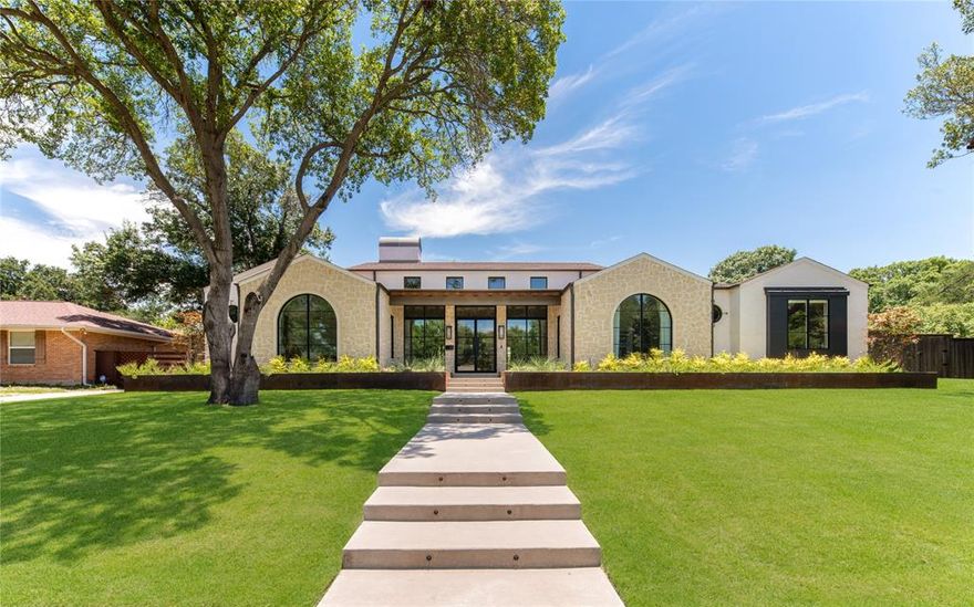 Gorgeous Modern Mediterranean inspired 2022 designer custom-home with all the bells and whistles! Features architecturally significant details throughout including stone clad interior walls, 15 foot high ceilings in foyer with exposed floating rafters and cast stone arches.

Chef’s kitchen is a jaw-dropper with custom white oak cabinetry, commercial grade appliances, quartzite countertops, designer lighting and separate adjacent pantry and prep kitchen. Primary suite features a dressing room inside the custom closet complete with W&D, direct patio access, and an adjacent private studio or office. 4 additional bedrooms each have an ensuite bathroom with designer finishes.

Expansive outdoor patio built for hosting with drop down screens and zoned HVAC. High-end pool-spa package, synthetic grass, and full landscaping package. Situated on a 0.4 acre sprawling lot in prime Janmar location. 3 car garage, mirrored gym, and custom finished media room add to appeal— this home has it all!