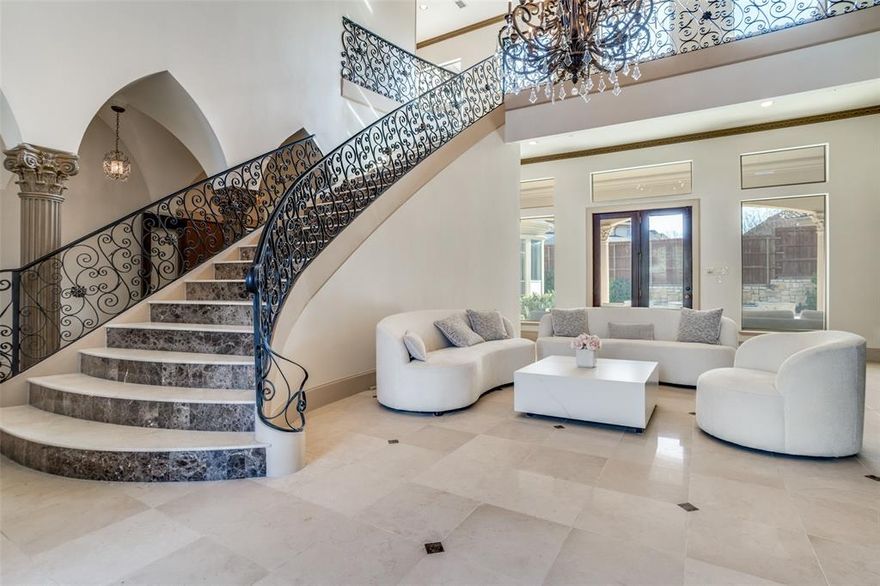 The best location in Stonebriar! This stunning home features 5 bedrooms, 4 full baths, and 3 half baths, along with 3 beautiful fireplaces.
From the moment you enter, you’ll notice the elegant marble flooring throughout the entry and hallways, complemented by a grand high-ceiling entrance with a fireplace and Italian-inspired design.
The private office showcases rich wood finishes and connects to a walk-in closet. The spacious primary suite features an arched seating area with easy access to a luxurious bathroom, complete with separate sinks and an oversized standing shower with marble finishes.
The gourmet kitchen is equipped with double ovens and a built-in Viking refrigerator and stove, opening to a family room with soaring ceilings and custom cedar wood accents.
A beautifully designed iron staircase with marble steps leads upstairs, where you’ll find:
• Bedroom 1 with a private full bath and walk-in closet
• Bedrooms 2 & 3 connected by a Jack-and-Jill bathroom, each with walk-in closets
The upstairs also features nail-down hardwood floors throughout the hallway and game room. The game room boasts a cedar wood ceiling, a built-in bar, and elegant finishes. The media room includes custom carpeting and surround sound for the perfect entertainment experience. A conveniently located half bath serves both spaces.
Step outside to enjoy a beautifully designed swimming pool and professionally landscaped yard—perfect for relaxing or entertaining.
This home is a true blend of luxury, comfort, and timeless design.