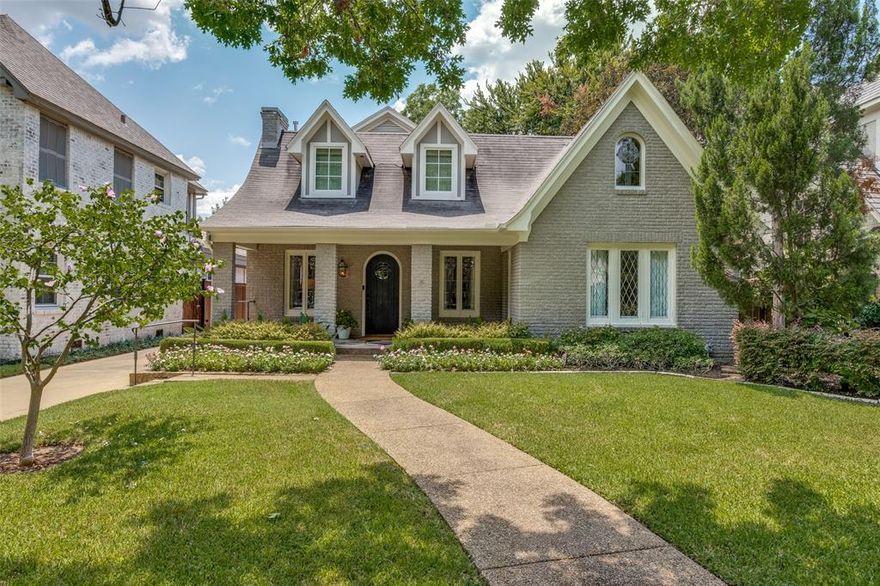 Tucked away on one of Highland Park’s most desirable streets, this charming Tudor blends timeless architecture with thoughtful modern updates. The first floor welcomes you with a cozy den, a spacious dining room, and an open concept kitchen and family room, perfect for everyday living and entertaining alike. A large guest bedroom with an adjacent full bath completes the main level. Upstairs, you’ll find three bedrooms, including a serene primary suite with a luxurious ensuite bath and an expansive walk-in closet. Two additional bedrooms share a beautifully appointed bath, while a versatile bonus room offers the perfect spot for a home office, study area, or playroom. Ideally located, this home is just a short stroll to Armstrong Elementary with easy access to Snider Plaza, SMU, and Highland Park Village.