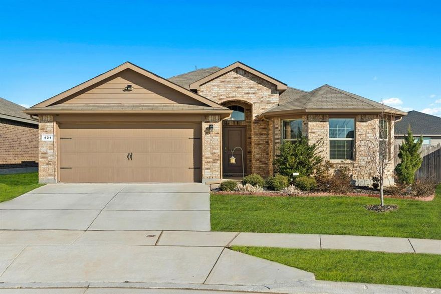 Welcome home to this beautifully designed 4 Bedroom, 2 Bath residence, ideally located on a quiet street tucked away from main traffic, offering added privacy. The open floor plan is perfect for both everyday living and entertaining. The spacious and private primary suite provides a relaxing retreat with a large walk-in closet and a well-appointed en suite bathroom featuring dual sinks. The kitchen is a true standout, showcasing granite countertops, abundant counter space, a large walk-in pantry, and a center island ideal for meal prep or casual dining. Stylish hardware and a thoughtfully designed backsplash add an extra layer of detail, giving the kitchen a refined, upscale look. Step outside to enjoy a premium backyard with a covered patio and plenty of space for entertaining, gatherings, or outdoor relaxation. New mulch has been added since photos were taken, enhancing the landscaping and curb appeal. The home is also equipped with French drains, providing added peace of mind and improved drainage around the property. Located in a community offering two pools, a park with playground, and a dog park, this home perfectly blends comfort, functionality, and lifestyle. Don’t miss the opportunity to make it yours!