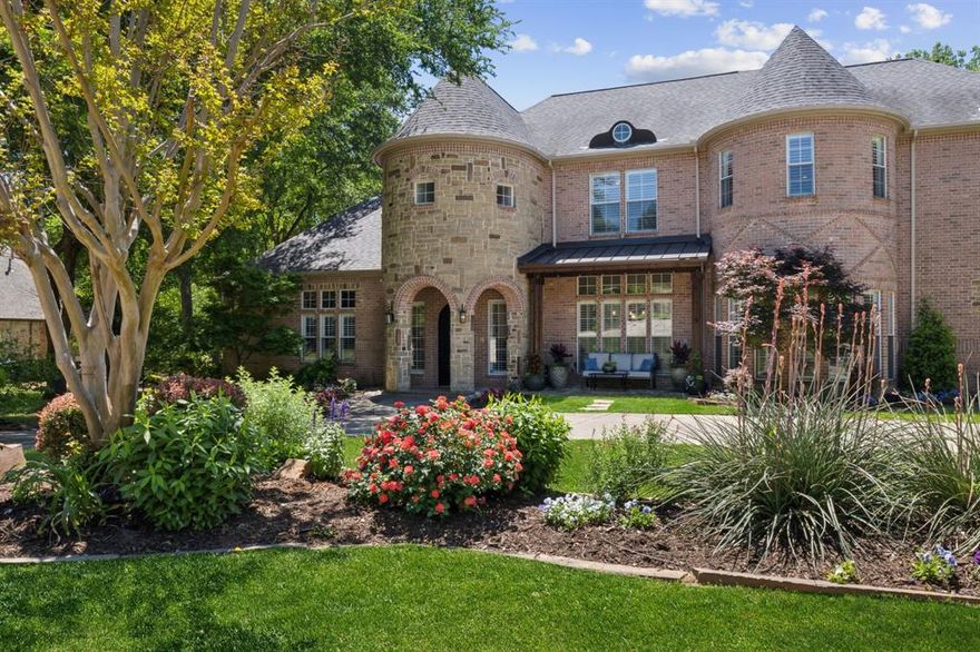 Exceptional creek lot in highly coveted Oakwood Estates, zoned to award-winning Lovejoy ISD. Situated on 1.5 beautifully treed acres, this updated home offers the perfect blend of elegance and functionality in a quiet, private setting just minutes from top-rated schools, shopping, and dining. A brand-new custom iron door opens to a stunning, light-filled entry with views of the backyard oasis. Formal two-story living room includes a fireplace, built-ins, and a wall of windows overlooking the serene backyard. Gourmet kitchen boasts a SubZero fridge and freezer, double ovens, warming drawer, 2 dishwashers, island, bar seating, and breakfast area—open to a spacious family room with floor-to-ceiling gas fireplace and wood beamed ceilings. The private primary suite features backyard access, double-sided fireplace, mini kitchen, and a beautifully remodeled bath with dual vanities and walk-in closet. Downstairs includes a dedicated office with built-ins and French doors, plus a guest suite with full bath and bonus space perfect for a second office. Upstairs offers three additional bedrooms—one with en-suite bath and two joined by Jack-and-Jill—plus a large game room with bar and balcony, media room with built-ins and equipment, and a hidden 17x17 storage room. The oversized 4-car garage provides even more storage. Step outside to your personal retreat with a fully renovated pool, spa, and outdoor kitchen under a gazebo. This special street is known for its friendly community and incredible Halloween festivities—don’t miss your chance to live in one of the best locations in Fairview!