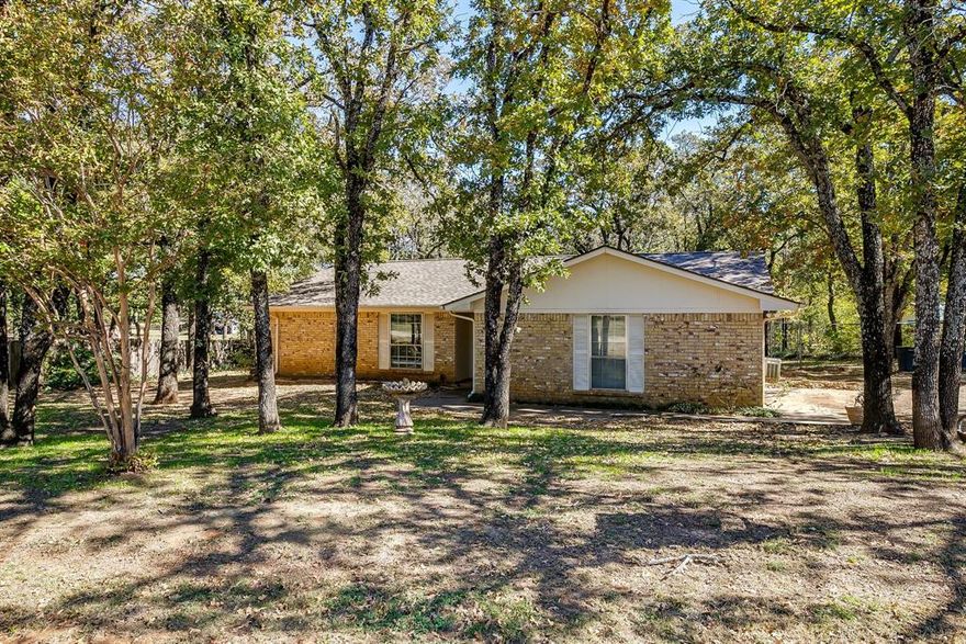 Discover the potential in this classic brick home built in 1975, perfectly situated just outside the city limits of Alvarado, Texas. Nestled on 2.73 unrestricted acres, this property offers space, freedom, and endless possibilities — bring your horses, livestock, or outdoor projects and make it your own. The land features a beautiful natural creek that must remain natural, however it stays primarily dry; mature trees, and plenty of open area for grazing, gardening, or building additional structures. With no known restrictions, you’ll have the flexibility to create your ideal country retreat or investment property. The home is being sold as-is and will need updates, but offers a solid foundation and the charm of a traditional brick home. Whether you’re looking to renovate, expand, or build new, this is a rare opportunity to own a slice of peaceful country living while staying close to city conveniences.